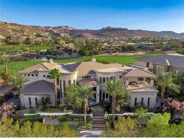 Luxury home with stunning golf course and mountain views at 1493 Foothills Village Dr, Henderson, NV 89012