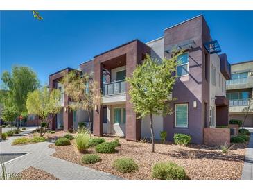 Modern two-story townhome with landscaped grounds at 1254 Venue St # 102, Las Vegas, NV 89135