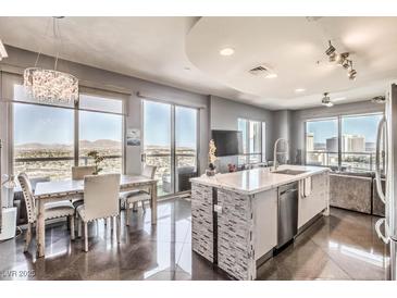 Modern kitchen with island, stainless steel appliances, and city views at 200 Sahara Ave # 1708, Las Vegas, NV 89102