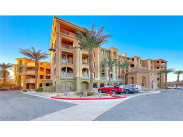 Luxury condo building with palm trees and ample parking at 30 Via Mantova # 108, Henderson, NV 89011