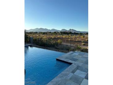 Stunning pool with mountain views at 9316 Provence Garden Ln, Las Vegas, NV 89145