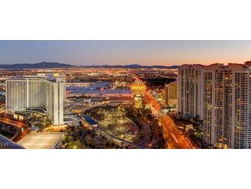 Stunning aerial view of Las Vegas skyline at night, showcasing city lights and high-rise buildings at 222 Karen Ave # 3601, Las Vegas, NV 89109