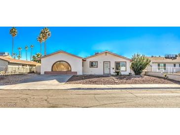 Ranch style home with carport and landscaped yard at 3091 Liberty Cir, Las Vegas, NV 89121