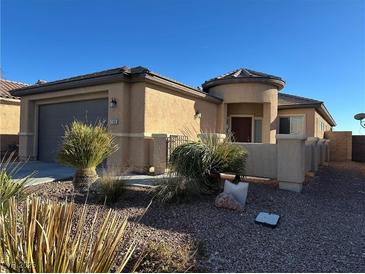 Single-story house with desert landscaping and a two-car garage at 7109 Bocaire Dr, Las Vegas, NV 89131