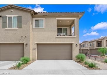 Attached two-car garage with ample parking space at 7324 N Decatur Blvd # 1, Las Vegas, NV 89131