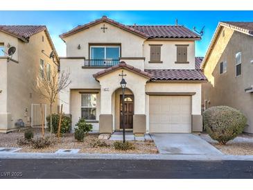 Two-story house with tan exterior, brown roof, and landscaping at 4217 Perfect Drift St, Las Vegas, NV 89129