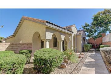 Attractive single-story home with landscaped walkway at 1067 Garden Cress Ct, Las Vegas, NV 89138