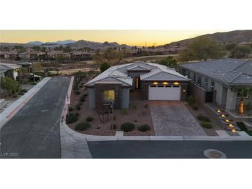 Aerial view of house and community, showcasing desirable location and neighborhood at 138 Reflection Cove Dr, Henderson, NV 89011