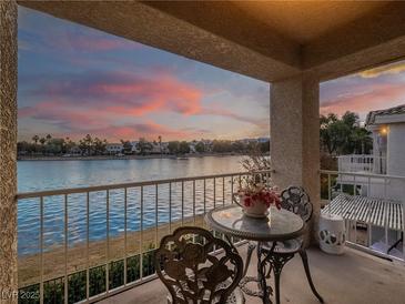 Enjoy breathtaking sunset views from this lakefront balcony at 2521 Seascape Dr, Las Vegas, NV 89128