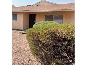 Ranch style home with mature landscaping and a well-maintained front yard at 5116 Golden Ln # A, Las Vegas, NV 89119