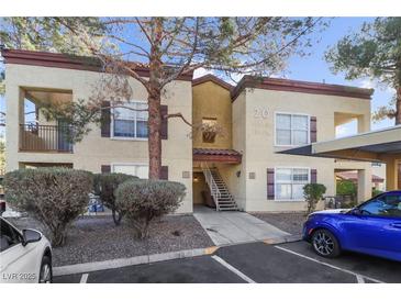 Two story condo building with parking and landscaping at 2801 N Rainbow Blvd # 235, Las Vegas, NV 89108