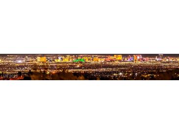 Panoramic night view of the illuminated Las Vegas Strip, showcasing its vibrant skyline and entertainment at 3 Pine Hollow Dr, Henderson, NV 89052