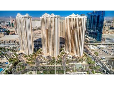 Aerial view of three luxury high-rise residential buildings at 135 E Harmon Ave # 2302, Las Vegas, NV 89109