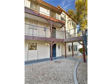 Two-story building exterior with balconies and walkways at 2080 Karen Ave # 49, Las Vegas, NV 89169