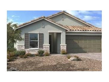 One-story home with stone accents and a two-car garage at 9195 Oakdale Ranch Ct, Las Vegas, NV 89139