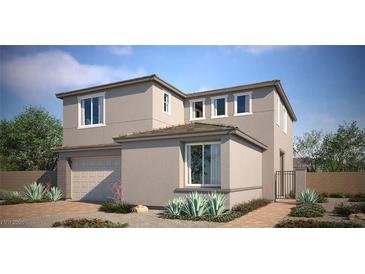 Two-story house with attached garage and desert landscaping at 9247 Lunar Phase St, Las Vegas, NV 89143