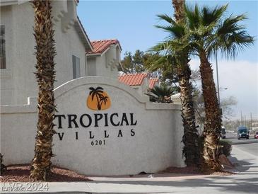 Tropical Villas community entrance sign, welcoming residents and guests at 6201 E Lake Mead Blvd # 218, Las Vegas, NV 89156