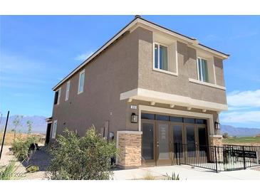 Two-story modern home with attached garage and mountain views at 630 Moonbeam Way, Mesquite, NV 89027