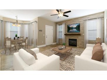 Bright living room with fireplace, tile floors, and neutral decor at 10550 W Alexander Rd # 1156, Las Vegas, NV 89129