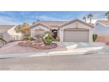 Charming single-story home with landscaped front yard and attached two-car garage at 10725 Sky Meadows Ave, Las Vegas, NV 89134