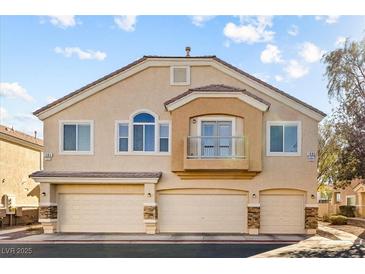 Two-story house with three-car garage and balcony at 1086 Sheer Paradise Ln # 101, Henderson, NV 89002