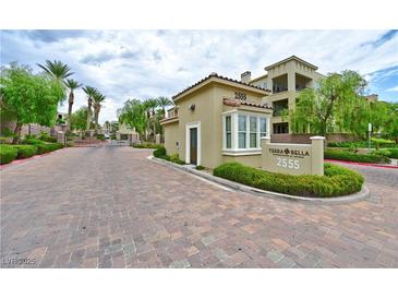 Gated community entrance with landscaping and address signage at 2555 Hampton Rd # 3206, Henderson, NV 89052