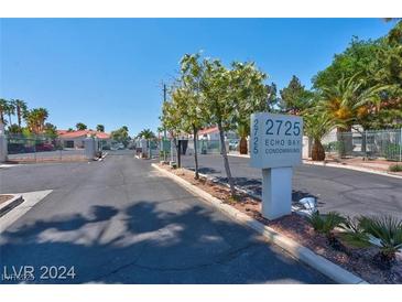 Condominium entrance with gated access and signage at 2725 S Nellis Blvd # 1140, Las Vegas, NV 89121