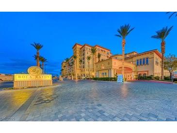 Boca Raton Condo exterior at night, showing building entrance and landscaping at , Las Vegas, NV 89123