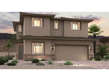 Two-story home with attached garage and desert landscaping at 852 Camargo St, Henderson, NV 89011