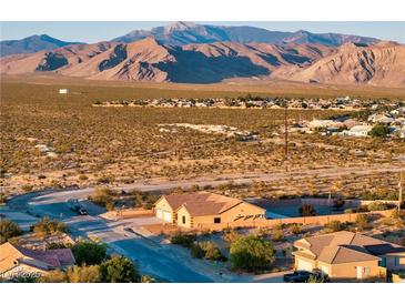 Aerial view of a house and surrounding desert landscape at 2051 Saginaw Ave, Pahrump, NV 89048