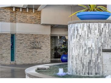 SkyLas Vegas building exterior with modern architecture and a water fountain at 2700 Las Vegas Blvd # 2006, Las Vegas, NV 89109