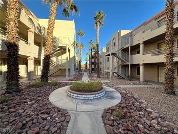 Neat landscaping and attractive building exteriors create a welcoming community atmosphere at 2076 Mesquite Ln # 302, Laughlin, NV 89029