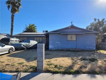 Ranch style home with carport and mature landscaping at 5809 Pebble Beach Blvd, Las Vegas, NV 89108