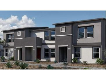 Modern two-story townhouses with attached garages and desert landscaping at 9436 Peaceful River Ave # Lot 63, Las Vegas, NV 89178