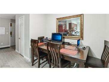 Small dining area with table and chairs, suitable for a small Gathering at 5405 Indian River Dr # 392, Las Vegas, NV 89103