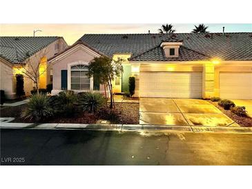 Attractive two-story home with a two-car garage and well-manicured landscaping at 2853 Anteres St, Las Vegas, NV 89117