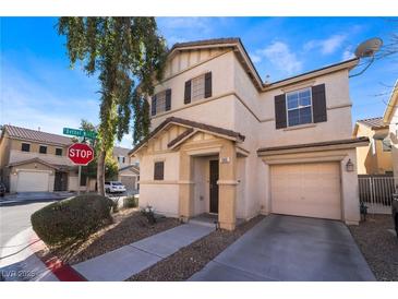 Two-story house with attached garage and front yard at 585 Dairy Creek Ave, Las Vegas, NV 89183