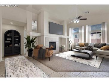 Spacious living room features a fireplace and ample natural light at 1006 Christopher View Ave, North Las Vegas, NV 89032