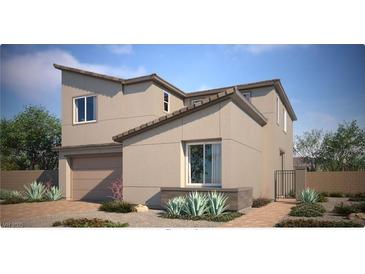 Two-story home with a modern design, attached garage, and desert landscaping at 9268 Copernicus Ave, Las Vegas, NV 89143