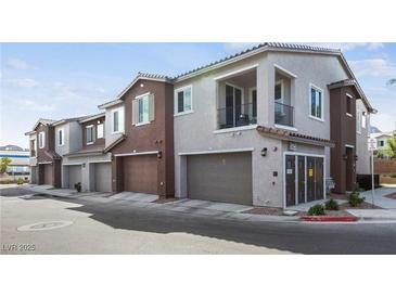 Two story townhome with attached garage and private balcony at 965 Nevada State Dr # 15103, Henderson, NV 89002