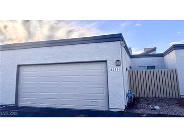 White garage door with address number 2253 visible at 2253 High Dunes Ln, Laughlin, NV 89029