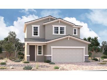 Two-story house with gray siding, attached garage, and landscaping at 9940 Angel Valley Dr, Las Vegas, NV 89178