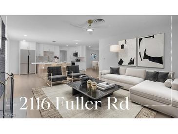 Open living room showcasing a stylish sectional sofa and modern coffee table at 2116 Fuller Rd, Las Vegas, NV 89108