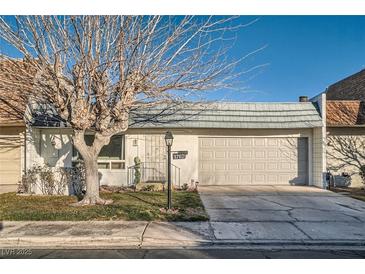 Ranch style home with attached garage and mature landscaping at 3762 Territory St, Las Vegas, NV 89121