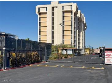 Exterior view of building with gated entrance at 3930 University Center Dr # 410, Las Vegas, NV 89119