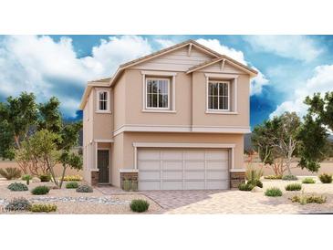 Two-story house with beige exterior, two-car garage, and landscaping at 6339 Ironville Dr, North Las Vegas, NV 89081