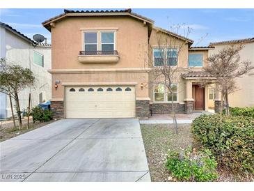 Two-story house with beige exterior, attached garage, and landscaping at 9609 Rolling Thunder Ave, Las Vegas, NV 89148