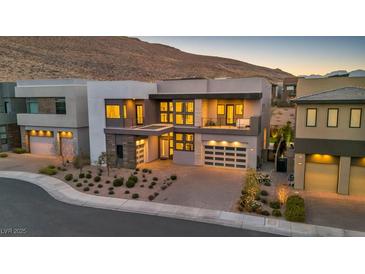 Stunning modern home with two-car garage and landscaped front yard at 10896 Tranquil Hills Way, Las Vegas, NV 89135