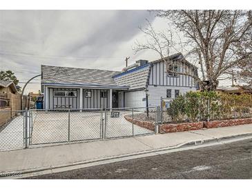 Ranch style home with fenced yard and mature trees at 5129 Del Monte Ave, Las Vegas, NV 89146