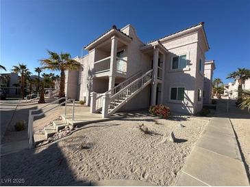 Two-story building exterior with stairs and landscaping at 1944 Las Palmas Ln # 175, Laughlin, NV 89029